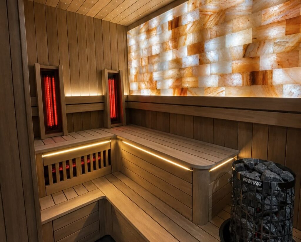 Hybrid sauna with a salt-brick wall and infrared panels by Nordik Wellness